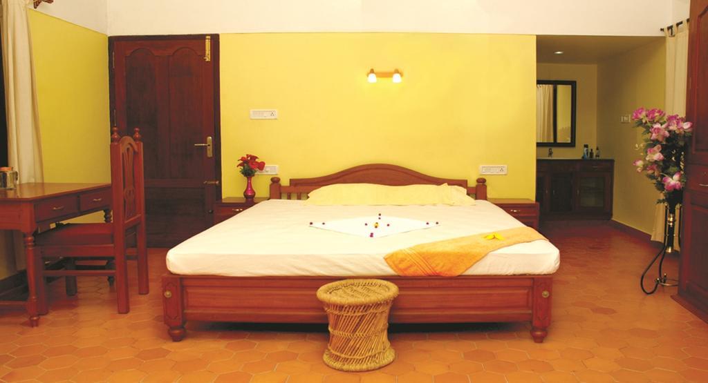 Amrutham Ayurvedic Village Resort Ковалам Номер фото
